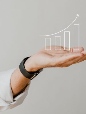Presenting arm isolated on beige Digital increasing bar graph with businessman hand overlay