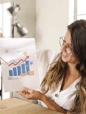 mid-shot-woman-showing-chart mid-shot-woman-showing-chart